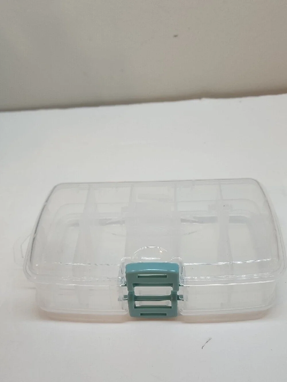 Doblo Sided Clear Stowaway Storage Box with Teal Latch
